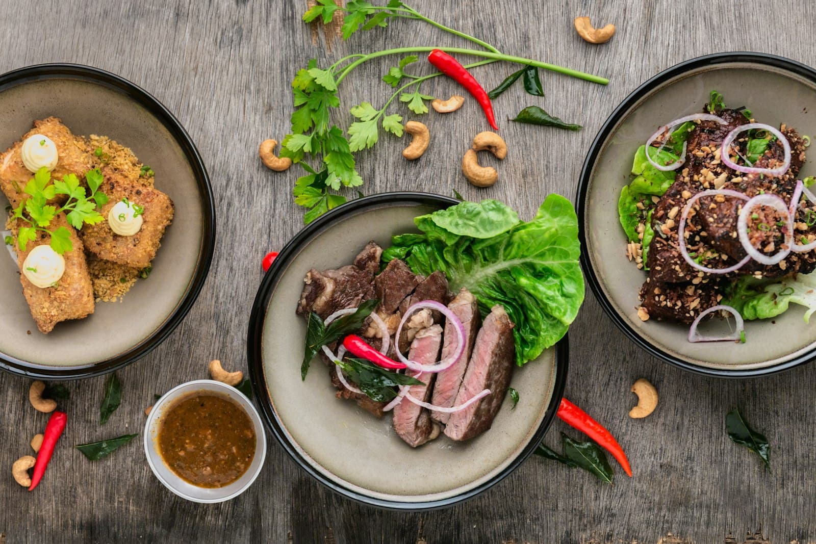 Chef-plated dishes with fresh herbs