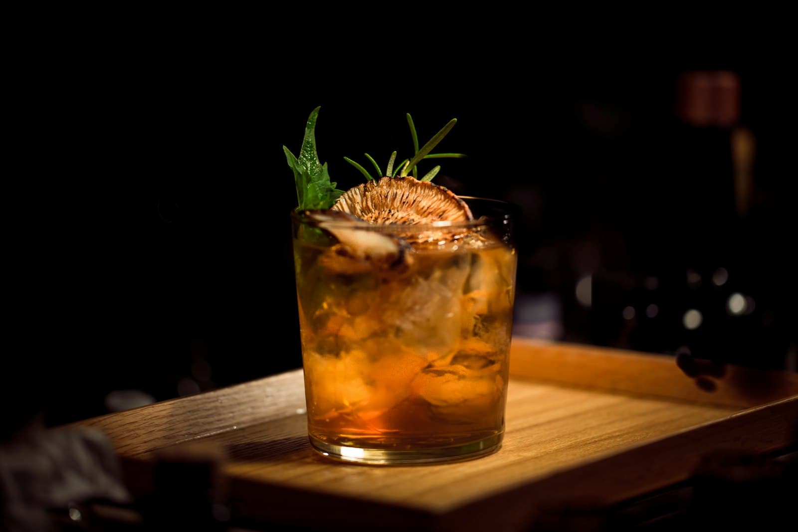 Old fashioned cocktail with an orange twist