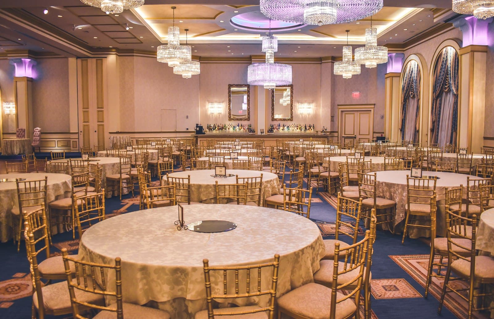 Elegant ballroom set for a wedding ceremony