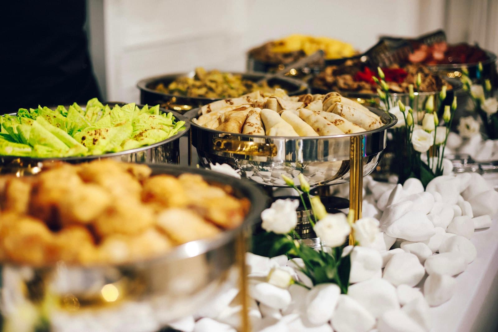 Chef plating catering dishes
